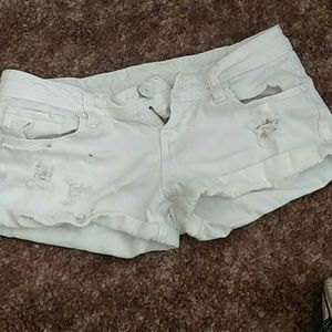 White distressed shorts