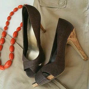 Peep toe pumps by Nine West