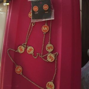 Get both Mk logo Orange set necklace and earrings