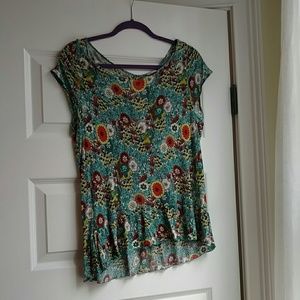 Anthropologie patterned top with ruffle hem