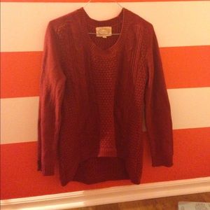 Deep red colored sweater