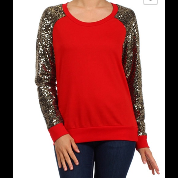 Red sweater with gold toned sleeves.