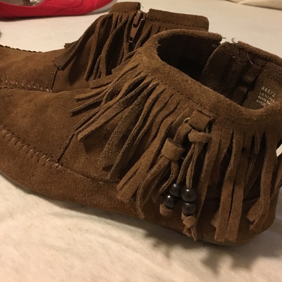 Tan fringe moccasin booties