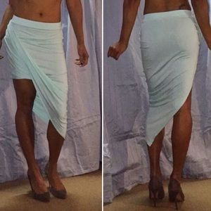 Baby blue asymmetric skirt.
