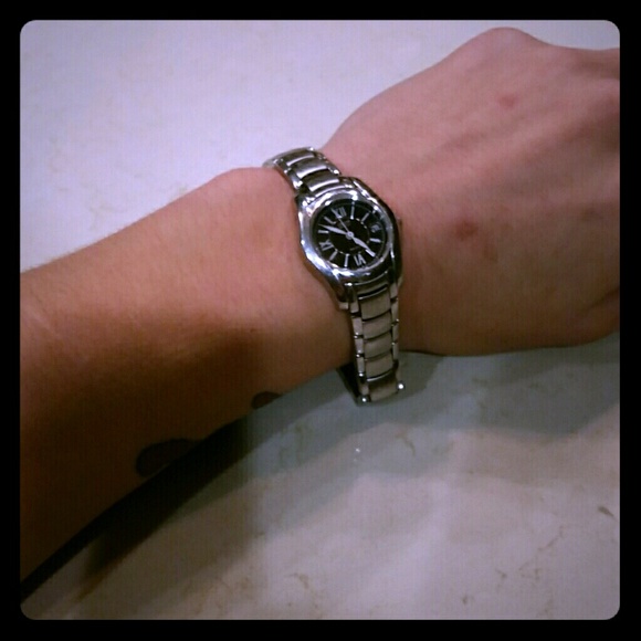 Silver Citizen watch- solar powered.