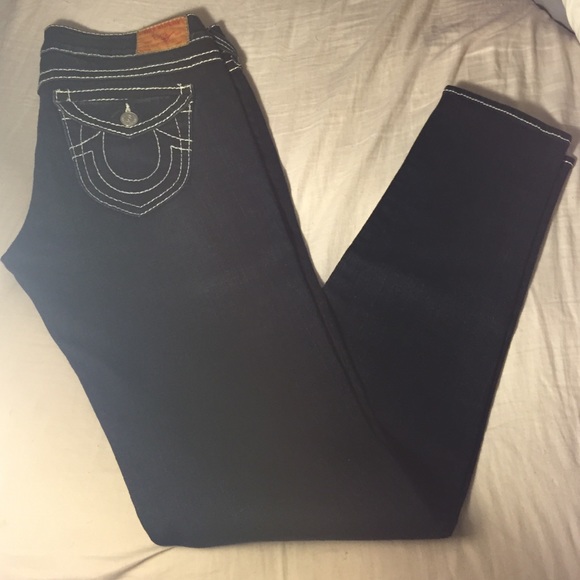 True Religion Jeans with white stitching.