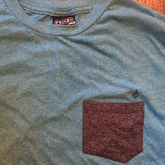 Men's blue Volcom t shirt with grey front pocket