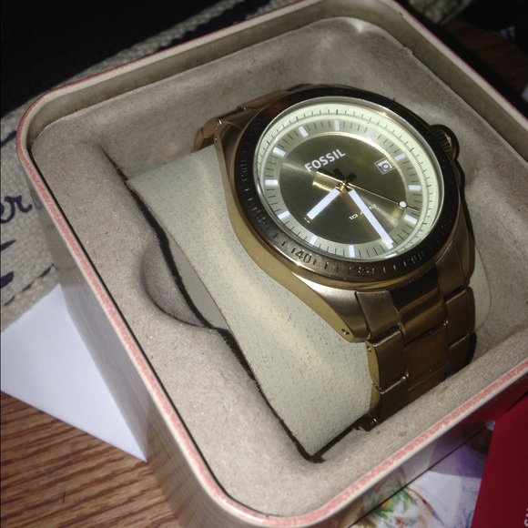 Gold fossil watch