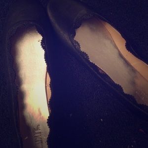 Black flats with lace like trim