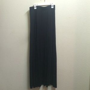 Long black skirt with two slits in the front.