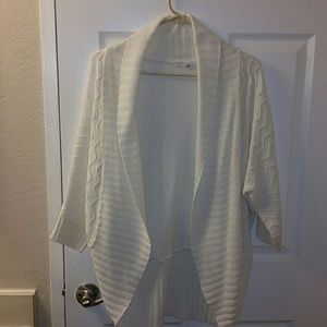 Cream oversized cardigan.