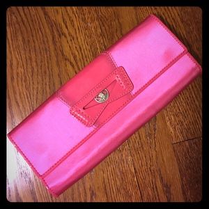 Like new hot pink Cole Haan clutch