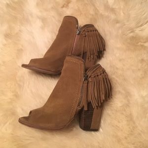 Too snug! Worn once and little tear on toe.