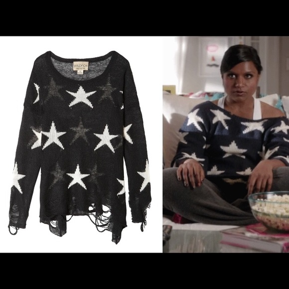 Black star sweater with ripped hem