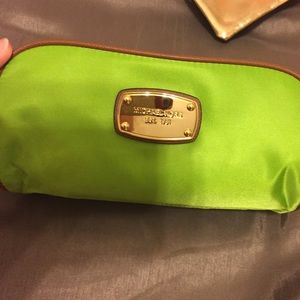 Green Michael Kors makeup Bag.