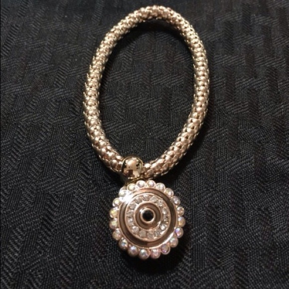 Gold tone charm bracelet