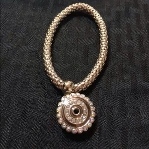 Gold tone charm bracelet