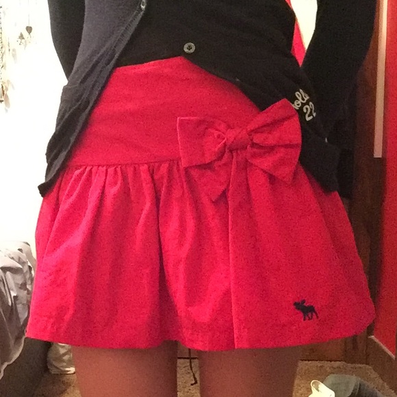 Red fit and flare skirt with bow accent