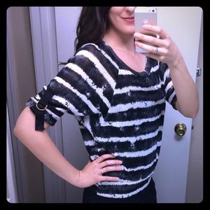 Black and white slouchy top with buckle sleeve