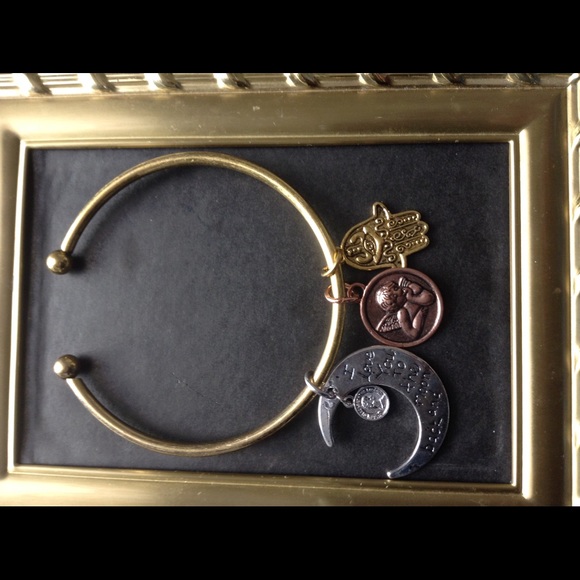 Gold tone fashion bangle with charm pendants - Picture 3 of 3