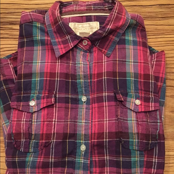 Gently used, long sleeve plaid shirt.