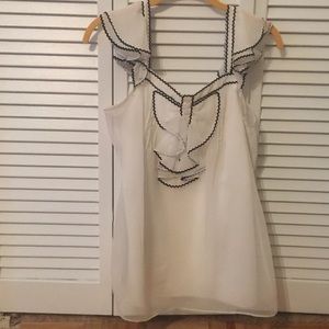 Black and white ruffled top.short sleeve ruffles.