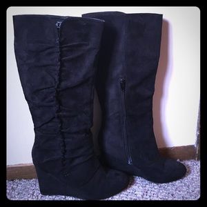 Black wedge boots