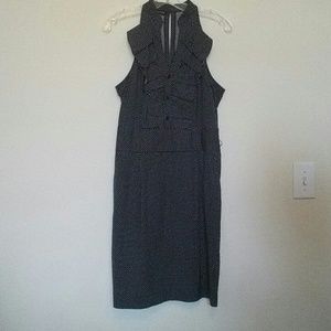 Cute fitted ruffled and polka dotted dress!