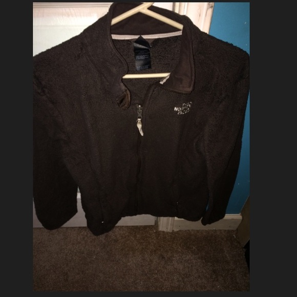 Brown North Face jacket.