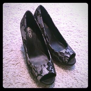 Only worn once Aldo black and silver heels