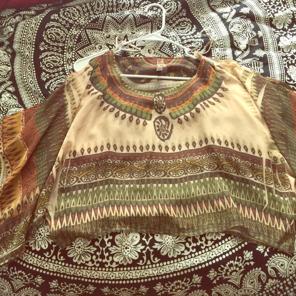 Cut open shoulder sheer shirt