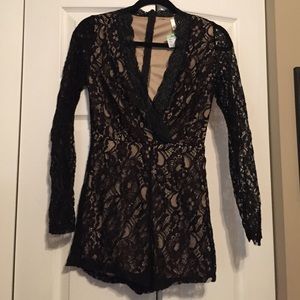 Black lace low cut romper