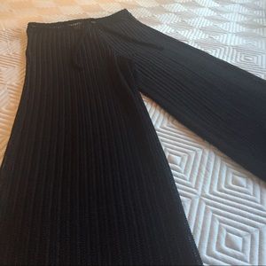 See through swim cover pants.