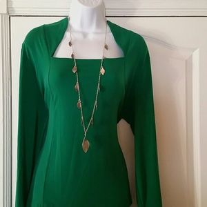 Emerald green blouse.