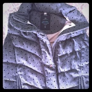 Grey puffer vest with black polka dots 😎