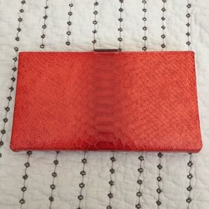 Snake skin print clutch