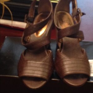 $8 brown wedge like sandals. Gently used.