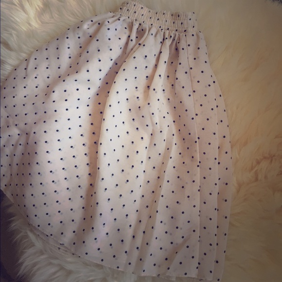 Sheer, cream skirt with black dots
