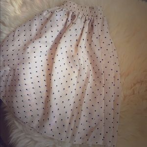 Sheer, cream skirt with black dots