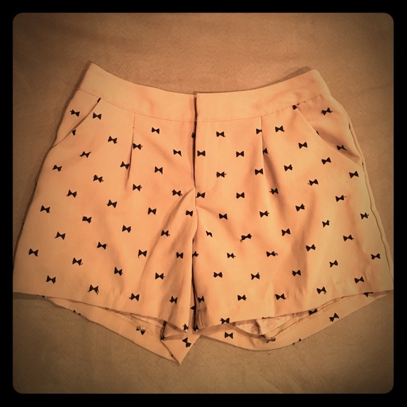 Cream shorts with black bows
