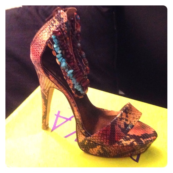 Platform snakeskin heels with beaded ankle strap