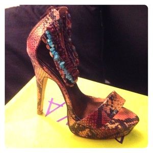 Platform snakeskin heels with beaded ankle strap