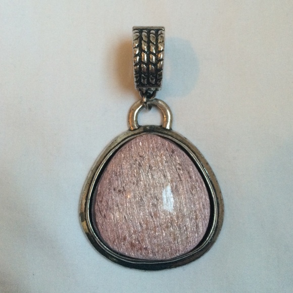 Silver tone pink stone pendant/enhancer.