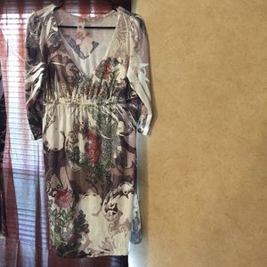 Dress- short-mid length. 3/4 sleeves