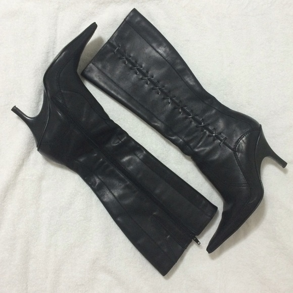 Knee high black heeled boots