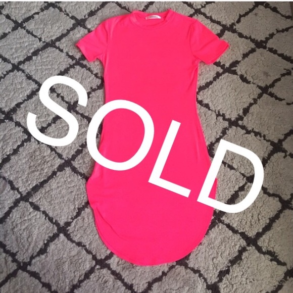 Neon pink dress with bottom rounded hem
