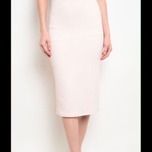 Below the knee pencil skirt.