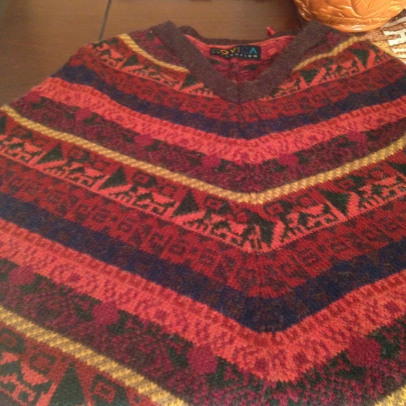 Poncho bought as a medium but really a small