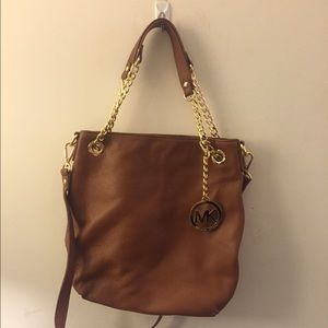 Authentic mk purse tan with charm