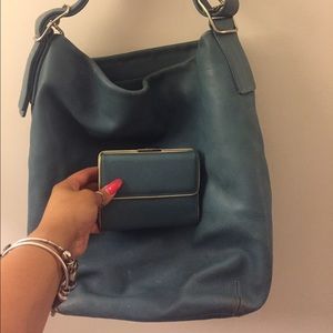 Blue leather coach purse with matching wallet